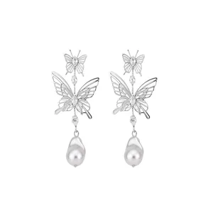 Elegant hollow butterfly earrings with zircon inlay and teardrop pearl charms for women