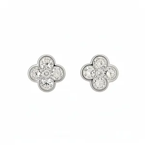 Elegant silver-toned flower stud earrings featuring sparkling clear zircon stones