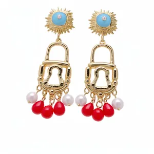 Exquisite gold-plated lock earrings with sun-eye motif and colorful pearl tassels