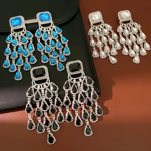 Exquisite luxury rhinestone chandelier earrings in blue, black, and white colors detail