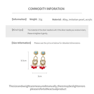 Detailed product specifications for gold lock earrings with colorful beads and tassels.