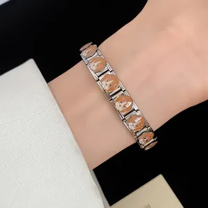 Elegant stainless steel Italian charm bracelet with enamel dog pattern for women's gift.