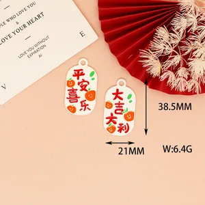 Macro detail of DIY alloy charms showing dimensions 38.5mm x 21mm and weights 6.4g