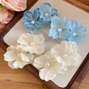 Elegant fabric flower hair clips with pearls for romantic seaside vacation styling