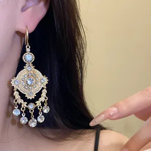 Vintage luxury palace style gold plated earrings with sparkling rhinestone wheat pendants