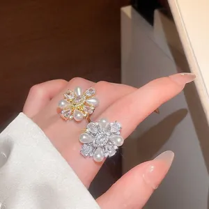 Elegant 14k gold plated pearl and zircon open rings featuring a vintage flower design