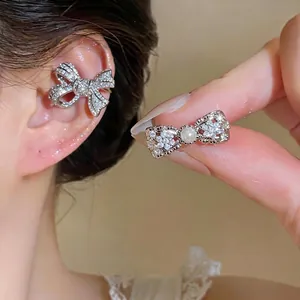 Elegant silver zircon bow ear cuff with pearl for non-pierced ears floral design