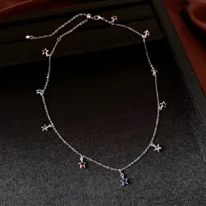 Retro silver chain necklace featuring multiple colorful glass star charms for women