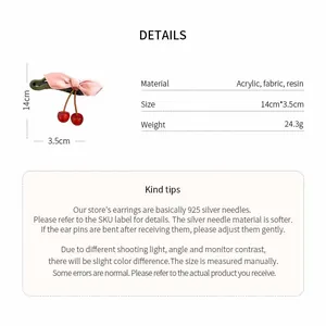 Specifications for the pink cloth bow and resin cherry hair clip showing size and materials