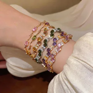 Luxury French vintage colorful zircon geometric bracelets for women on a model's wrist