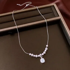 Elegant vintage pearl necklace with sparkling square zircon pendant, perfect for women