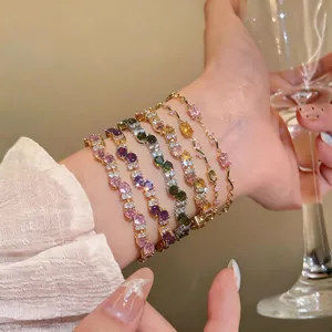 Exquisite colorful zircon bracelets with French vintage luxury design worn on woman's wrist