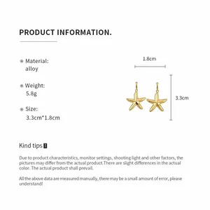 Detailed view of gold starfish drop earrings with size and weight specifications