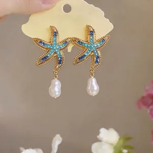 Summer style gold starfish drop earrings with blue rhinestones and baroque pearls