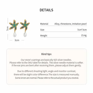 Detail view of starfish earrings with rhinestones and hanging imitation pearls