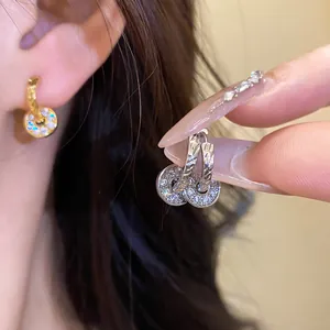 Close-up view of sparkling double hoop earrings with rhinestones in Korean ins style