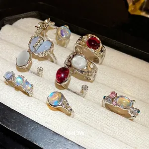 9-piece set of minimalist resin and rhinestone open rings for women in silver finish
