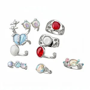 Elegant 9-piece silver-plated ring set with colorful resin gemstones and sparkly rhinestones