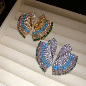 Vintage style fan-shaped earrings with colorful stones in gold and silver finishes