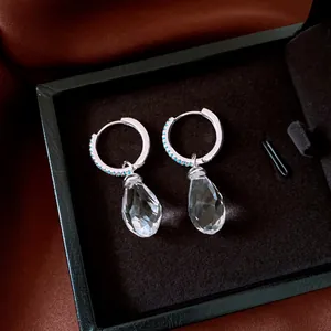 Elegant silver drop earrings with clear water-drop crystal pendants and blue zircon hoops