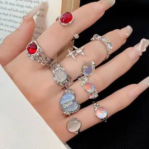 Detailed close-up showing a set of 9 vintage silver resin rhinestone open rings for women
