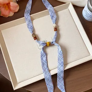 Elegant blue plaid chiffon necklace with decorative wooden beads, perfect summer accessory