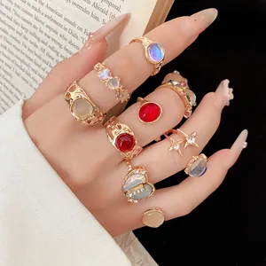 Detailed view of 9pcs adjustable gold ring set with colorful resin stones and shiny rhinestones