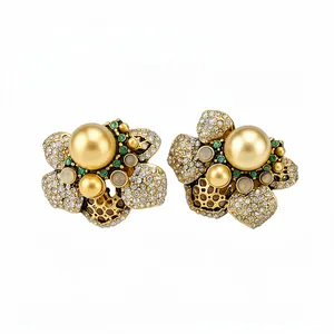 Exquisite vintage style flower stud earrings featuring golden pearls and sparkling rhinestones