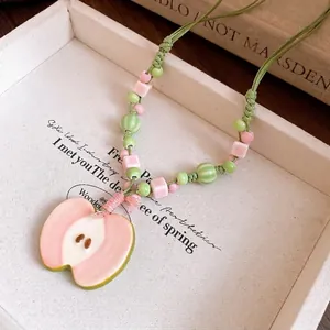 Handmade ceramic beaded apple pendant necklace with pink and green macaron tones