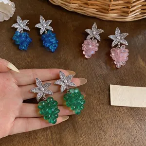 Elegantes pendientes de estrella de mar y cuentas de uva para un estilo de playa