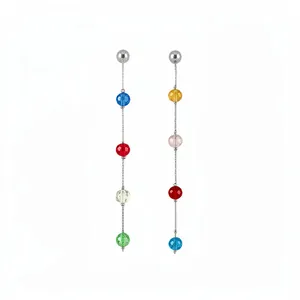 Elegant long dangle earrings with colorful faceted glass beads on silver chains.