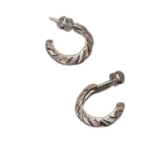 Pair of elegant silver-toned twisted hoop earrings with sparkling cubic zirconia stones