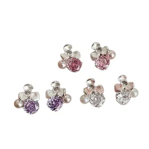 Elegant flower stud earrings with colorful zircon and pearls in multiple shades.