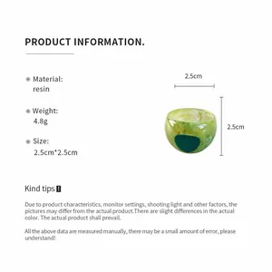 Detail view of green marbled resin ring with 2.5cm dimensions and weight specs.