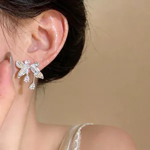 Elegant French-style silver-tone butterfly earrings with zircon stones and teardrop dangles