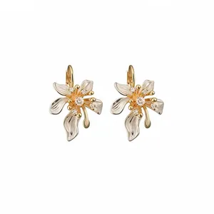 Elegant French style gold-tone flower hoop earrings with sparkling zircon accents