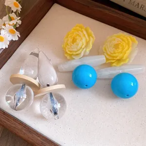 Vintage resin flower and blue bead earrings components with transparent teardrop pendants