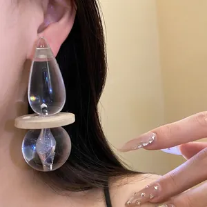 Exquisite vintage transparent resin drop earrings featuring a unique geometric wooden disc
