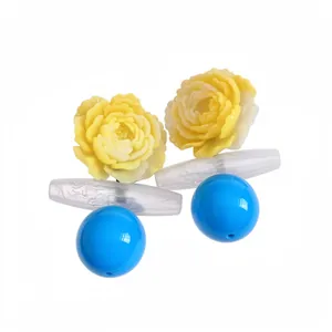 Vintage bold resin flower and bright blue spherical ball drop earrings for stylish women