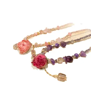Collane fatte a mano con perle di cristallo e rose stabilizzate in tonalità rosa e viola