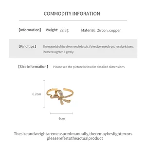 Detailed size guide for 18K gold plated zircon twisted bow open bangle showing 6.2x6cm