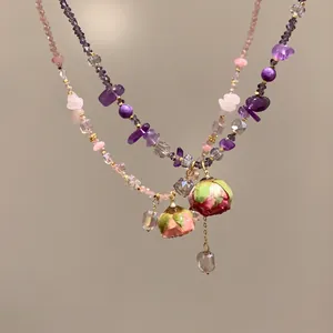 Collana fatta a mano con rosa stabilizzata e perline di cristallo ametista viola