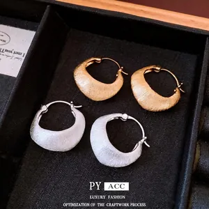 Elegant 18K gold plated brushed metal hoop earrings in gold and silver finish