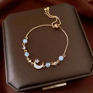 Elegant French vintage gold bracelet with cat eye stone and zircon moon pendant for women