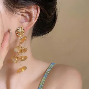 Elegant acrylic flower tassel earrings with golden alloy studs perfect for holiday style
