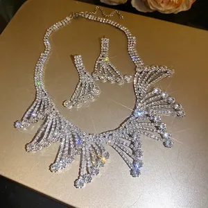 Elegant silver rhinestone lace necklace and earrings set with sparkling crystal pendants