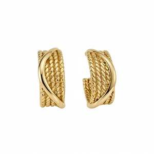 Elegant vintage gold C-shaped hoop earrings featuring twisted rope texture and smooth wrap detail