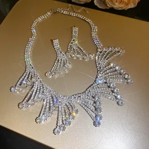 Macro detail of a sparkling rhinestone lace hollow necklace and earring jewelry set
