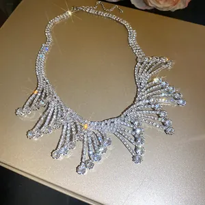 Close-up of glamorous rhinestone fringe necklace with sparkling crystal drops.