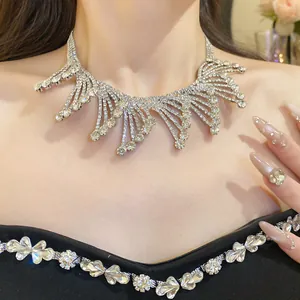 Detailed macro view of an elegant silver-toned rhinestone fringe choker necklace